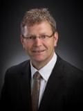Dr. David Allmacher
