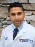 Dr. Kevin Debiparshad
